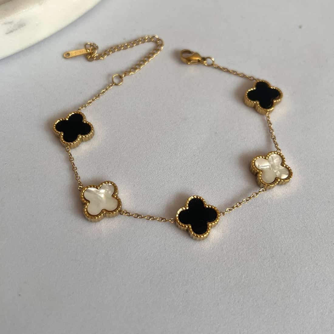 Elegant Clover Motif Bracelet– Black & White Enamel, Anti-Tarnish